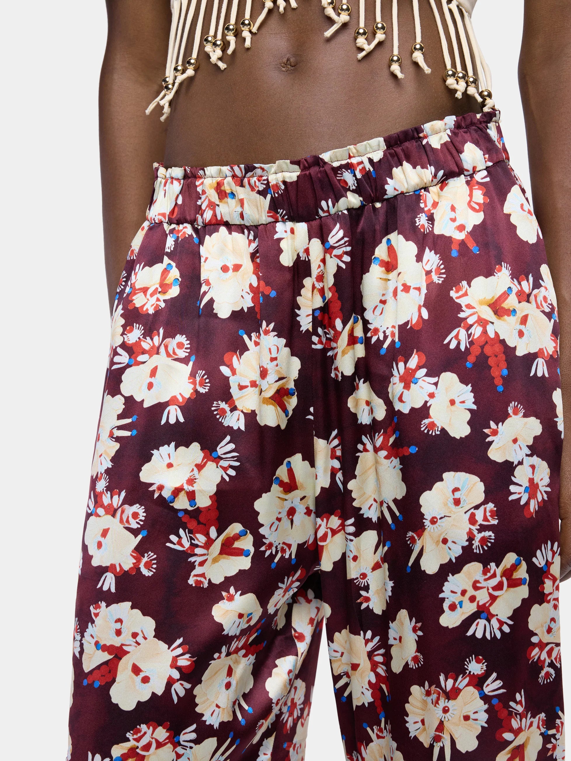 Magenta floral patterned straight trousers